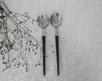 Salad servers made of stainless steel with teak handles