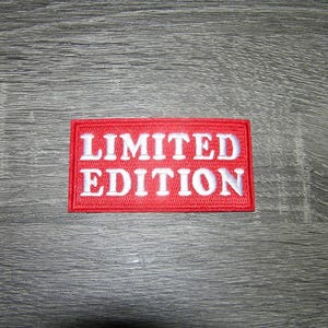 May include: Red rectangular patch with white embroidered text that reads "LIMITED EDITION".