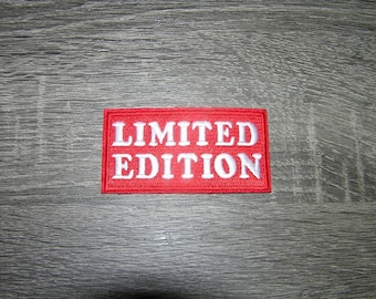 May include: Red rectangular patch with white embroidered text that reads "LIMITED EDITION".