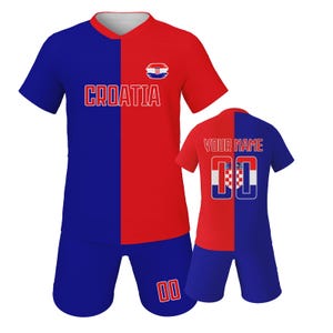 May include: A red and blue Croatia soccer uniform set. The jersey has the word "CROATIA" in white letters. The shorts and jersey have the number "00" in white. The set includes a jersey and shorts.