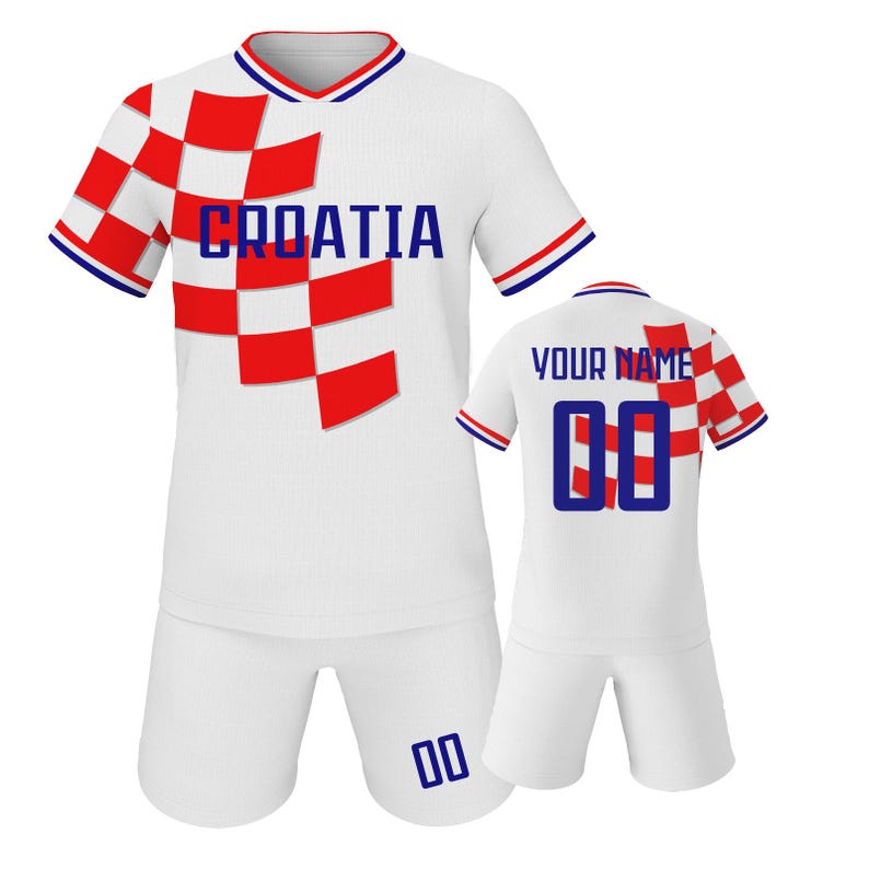 May include: White soccer uniform with red and white checkered design on the front and sleeves. The word "CROATIA" is printed in blue. The shorts have the number "00" in blue. A second uniform shows "YOUR NAME" and the number "00".