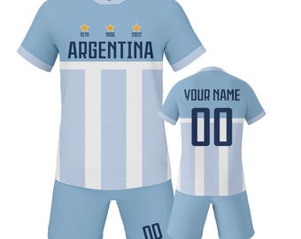 May include: Light blue Argentina soccer uniform set. The jersey has white vertical stripes, the word "ARGENTINA", and the years 1978, 1986, and 2022. The shorts have the number "00". A second jersey shows "YOUR NAME" and the number "00".