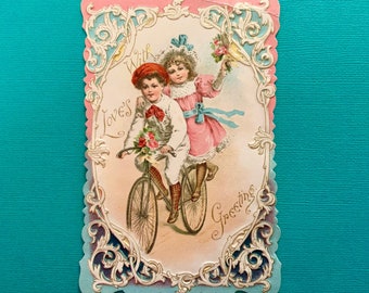 Vintage Valentines Day Card Girl and Boy on Bicycle Beautifully Embossed