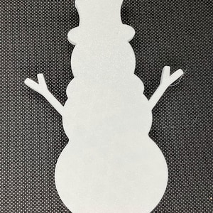 May include: White foam snowman cutout with a top hat and two arms. The snowman has three circles for the body.