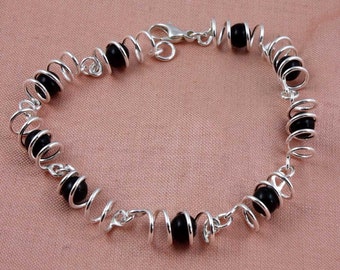 Spiral and Black Onyx Silver Bracelet