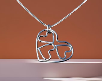 Elegant Triple Heart Pendant in Sterling Silver for Love and Unity