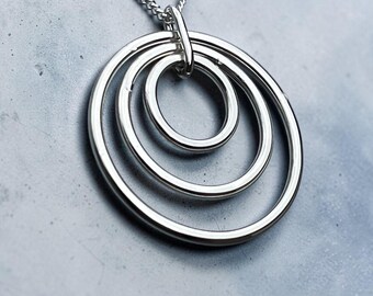 Modern Sterling Silver Pendant with Three Concentric Rings – Minimalist Design, High-Shine Finish, Layering Necklace