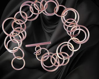 Multi -Ring Sterling Silver Bracelet