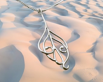 Elegant Nature-Inspired Sterling Silver Feather Pendant
