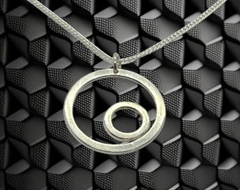Elegant Hand-Forged Circle Pendant with Drop Detail and Chain