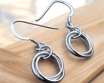 Handcrafted Sterling Silver Russian Earrings with Three Ring Design