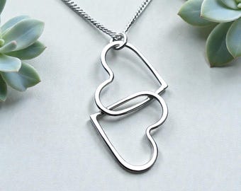 Elegant Sterling Silver Interlocking Hearts Pendant With Curb Chain