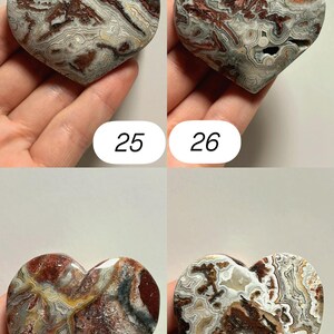 May include: Four heart-shaped stones with unique patterns and colors. Each stone is a different mix of brown, white, and gray, with some featuring red and yellow accents. Numbers 25, 26, 27, and 28 are printed on the image.