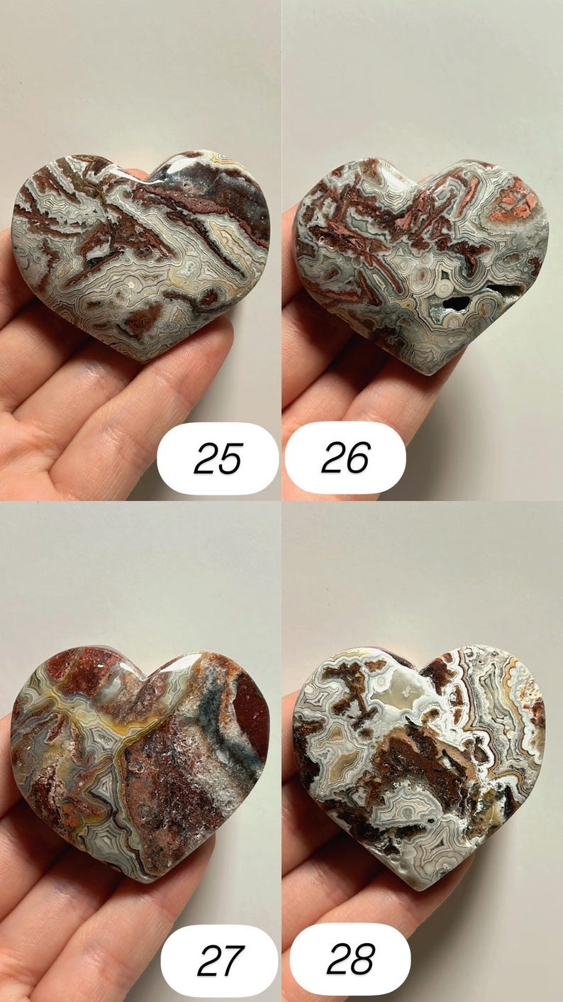 May include: Four heart-shaped stones with unique patterns and colors. Each stone is a different mix of brown, white, and gray, with some featuring red and yellow accents. Numbers 25, 26, 27, and 28 are printed on the image.