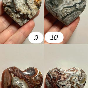 May include: Four heart-shaped stones with unique patterns and colors. The stones are held in a hand. The stones are numbered 9, 10, 11, and 12. The stones have a variety of colors, including brown, white, gray, and red.