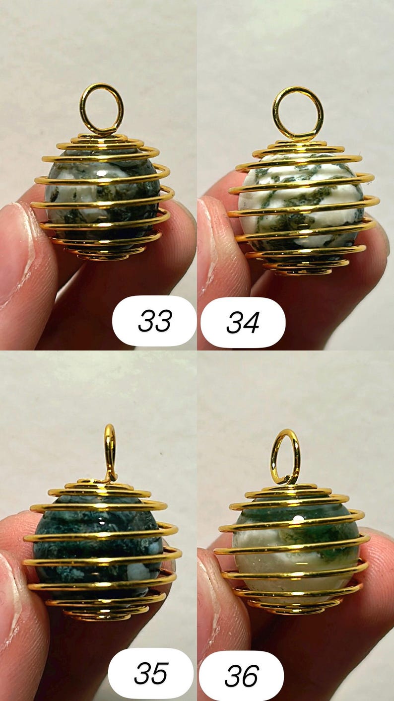 May include: Four gemstone pendants with gold-colored wire cage designs. The gemstones are spherical, with green and white patterns. Each pendant has a small loop at the top for hanging. Numbers 33, 34, 35, and 36 are printed below each pendant.
