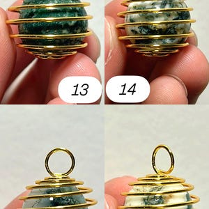 May include: Four gemstone pendants with gold-colored wire wrapping. Each pendant has a different colored stone, including green, white, and cream. The pendants are numbered 13, 14, 15, and 16.