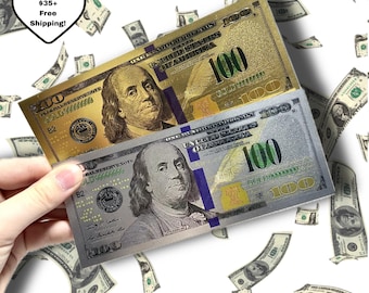 Könnte beinhalten: Eine Hand hält einen goldenen und silbernen 100-Dollar-Schein, mit einem Hintergrund aus fallenden Geldscheinen. Der goldene Schein liegt über dem silbernen Schein. Die Scheine zeigen ein Porträt von Benjamin Franklin.