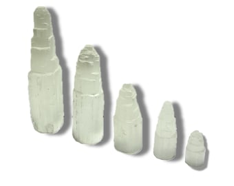 May include: Five selenite towers of varying sizes, ranging from small to large, with a white, translucent, and slightly cloudy appearance. The towers are arranged in a row from largest to smallest, with the largest tower on the left and the smallest tower on the right.