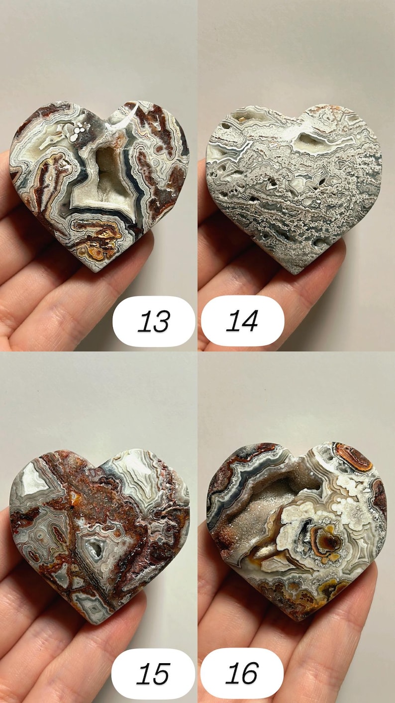 May include: Four heart-shaped agate stones with unique patterns and colors. Each stone is numbered 13, 14, 15, and 16. The stones feature a mix of brown, white, gray, and beige hues, with visible crystal formations.