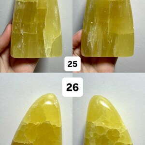May include: Four views of a freeform, yellow calcite stone. The stone has a smooth, polished surface with natural variations in color and texture. The text "(Two sides - 1 Freeform)" is at the top. Numbers "25" and "26" are also visible.