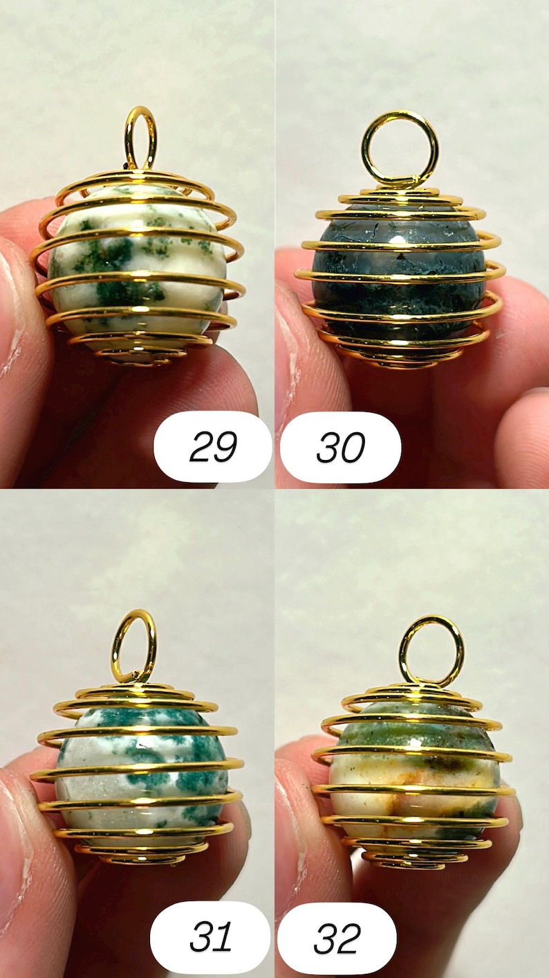 May include: Four gemstone pendants with gold-colored wire wrapping. Each pendant has a different colored stone: white with green, dark green, white with blue-green, and yellow-green. Numbers 29, 30, 31, and 32 are printed on the image.