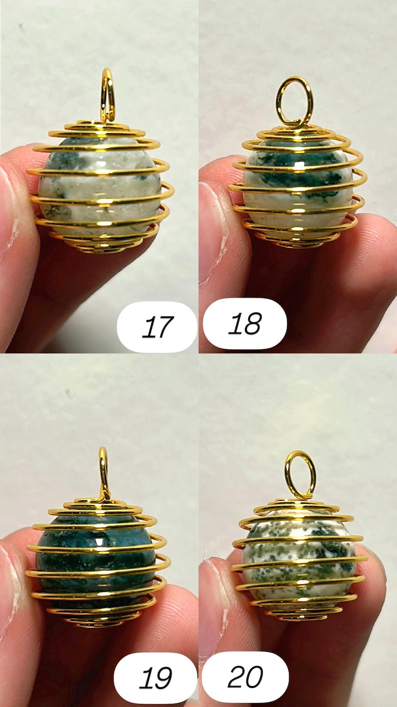 May include: Four gemstone pendants with gold-colored wire wrapping. Each pendant features a spherical stone in shades of green and white, encased in a spiral wire design. The numbers 17, 18, 19, and 20 are visible.