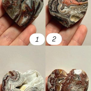 May include: Four heart-shaped stones with unique patterns and colors. The stones are numbered 1 through 4. The stones have a variety of colors including brown, red, white, and gray. The stones are held in a person's hand.