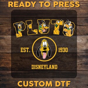 May include: A custom DTF transfer design featuring Pluto from Disney. The design includes the word "PLUTO" with Pluto character illustrations, the text "EST. 1930", and "DISNEYLAND". The text "READY TO PRESS" and "CUSTOM DTF" are also included.