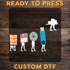 May include: A graphic illustration of the evolution of data storage, starting with a wooden file cabinet and ending with a USB drive. The illustration is on a woodgrain background with the text "READY TO PRESS" at the top and "CUSTOM DTF" at the bottom.