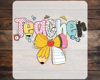 May include: A colorful graphic with the word "TEACHER" in a patchwork design, featuring a pencil-shaped bow with an apple, flowers, and school-themed icons. The text "READY TO PRESS" and "CUSTOM DTF" are at the top and bottom.