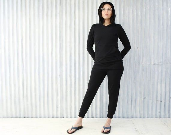 Person wearing an organic cotton-blend pullover hoodie