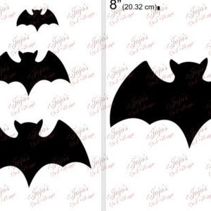 May include: Black bat silhouettes in various sizes, ranging from 5.08 cm to 20.32 cm. The bats have a classic Halloween design, with spread wings and pointed ears. The image includes the text "Jojo's Craft Shoppe".