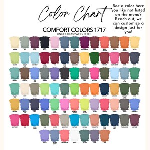 May include: Color chart for Comfort Colors 1717 unisex heavyweight tees, showcasing a wide array of colors. The chart includes shades like black, blue, pink, orange, and green, with text that says "See a color here you like not listed on the menu? Reach out, we can customize a design just for you!"