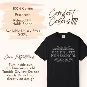 May include: Black t-shirt with the text "HOME SWEET HOMESCHOOL" in a white floral design. The shirt is made of 100% cotton, preshrunk, and has a relaxed fit. Available in unisex sizes S-3XL.