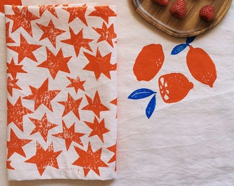 linen dinner napkins. orange stars on blush. hand block printed. placemats / tea towel. vases. boho decor. hostess gifting.