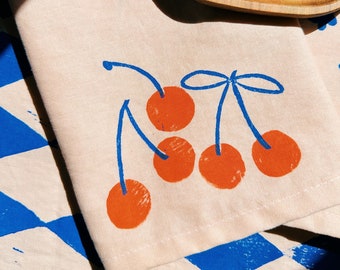 linen dinner napkins. orange cherry on blush. hand block printed. placemats / tea towel. vases. boho decor. hostess gifting.