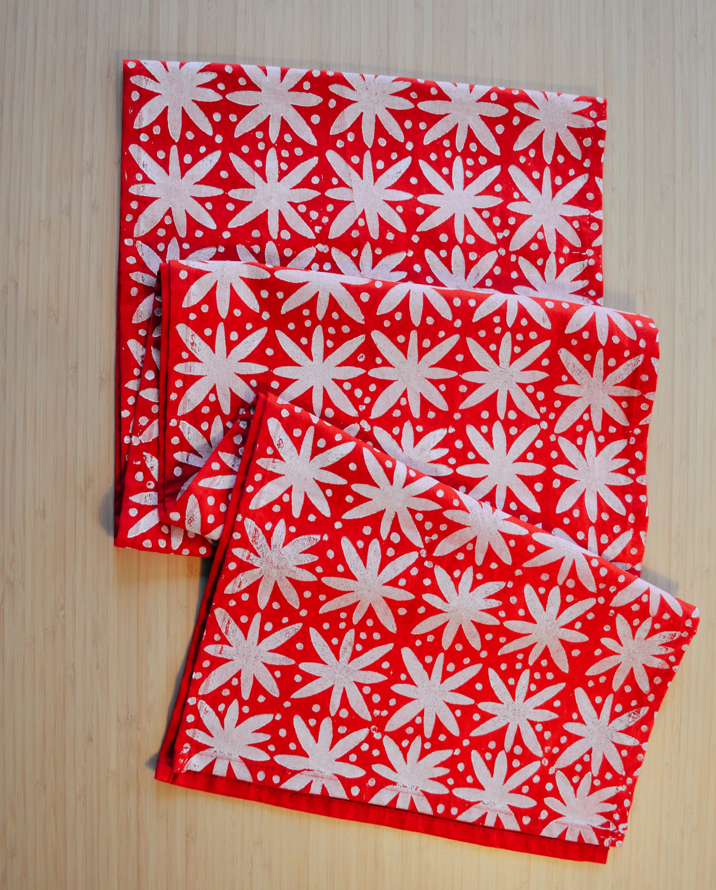 floral dots on red. block printed linen table runner. entertaining.…