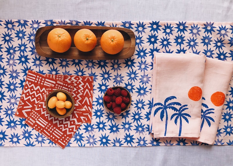 hand block printed table runner. sun burst on blush pink. boho decor. beach house. coastal. linen tablecloth. stars. star pattern.