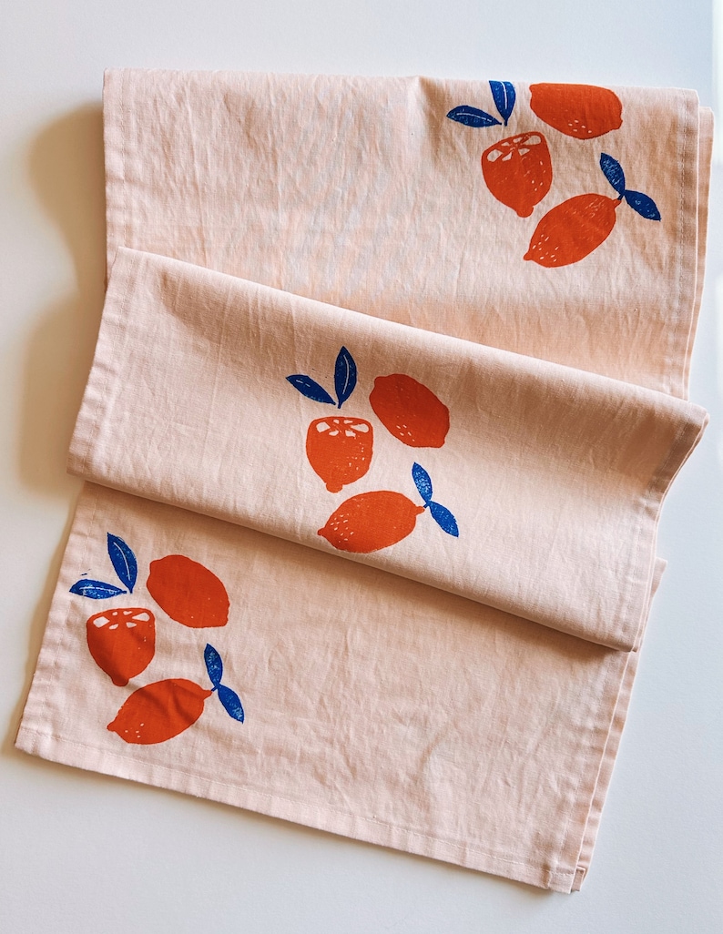 hand block printed table runner. oranges on blush pink. boho decor. linen tablecloth. birthday or dinner party decor. image 1