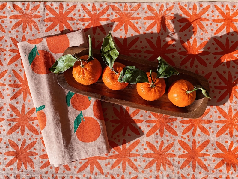 hand block printed table runner. floral dots on blush pink. boho decor. linen tablecloth. preppy beach house. abstract. orange. easter. image 1