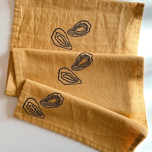 hand block printed table runner. oysters on mustard. boho decor. linen tablecloth. birthday or dinner party decor. image 1