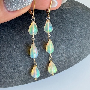 May include: A rustic wooden sign with the text "Welcome to our home" in white lettering. The sign features a distressed finish and a simple, inviting design, perfect for entryway decor.