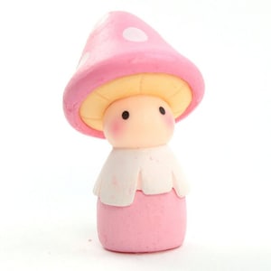May include: A pink mushroom figurine with a white collar and a cute face. The mushroom has white polka dots on the top.