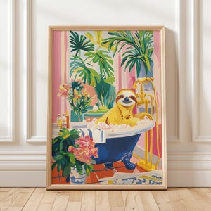 May include: A framed print shows a yellow sloth in a blue bathtub with bubbles. The bathroom setting features green plants, pink striped walls, and a gold tap. A whimsical and colourful illustration, perfect for a bathroom.