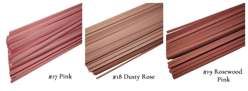 May include: Three bundles of thin wooden strips in different shades of pink. The bundles are labeled #17 Pink, #18 Dusty Rose, and #19 Rosewood Pink.