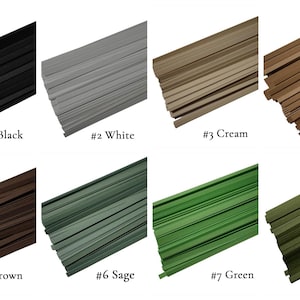 May include: Eight bundles of thin, flat, flexible craft wire in various colors: black, white, cream, tan, brown, sage green, green, and olive green. Each bundle is labeled with a number and color name.