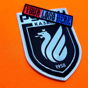 Embossed TPU Label – Raised Heat Transfer Logo with Tactile Finish for Sportswear, Hoodies, T-Shirts, and Outdoor Apparel