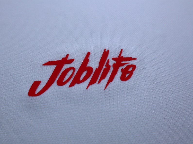 Puede incluir: Logotipo rojo "Joblito" sobre fondo blanco.