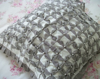 vintage charcoal brown and white gingham checked ruffled pillow with pearl accented pin wheels, lattice woven top. unfinished.